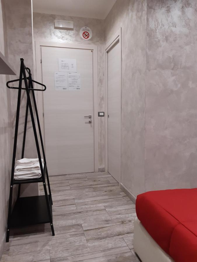 Apple Rooms Rome Airport Fiumicino Buitenkant foto A room at the hotel